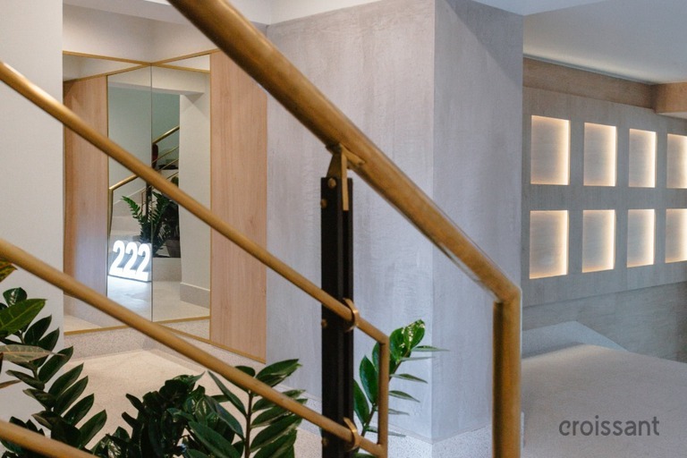 a close up of a traffic light hanging from the ceiling