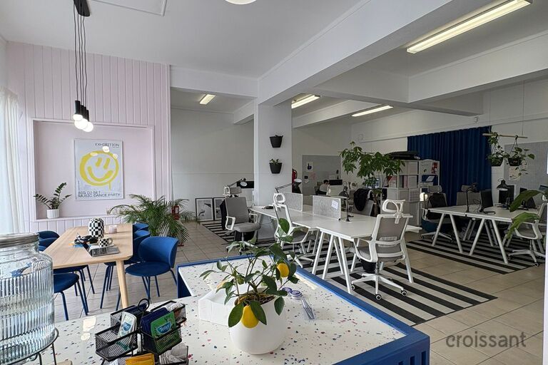 a chair sitting in front of a building