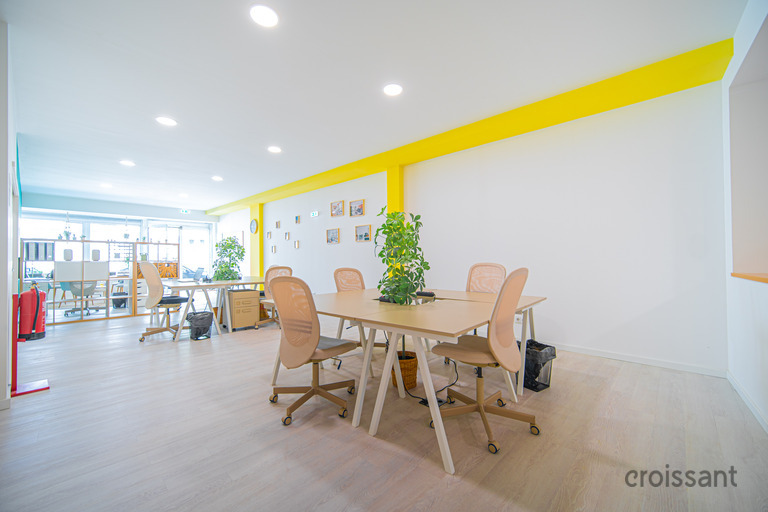 a room filled with furniture and a table