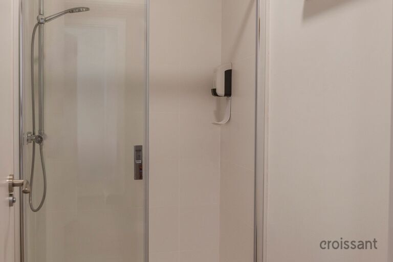 a close up of a shower in a room