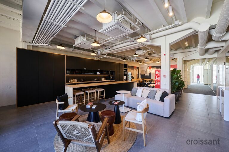 a room filled with furniture and a table