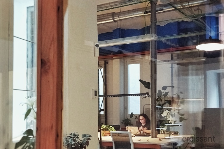 a kitchen with a sink and a mirror