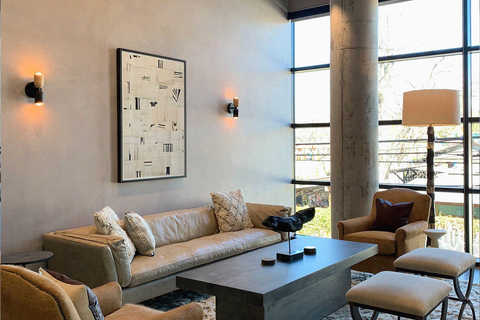 a living room filled with furniture and a fireplace