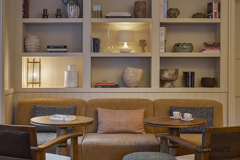 a room filled with furniture and a table