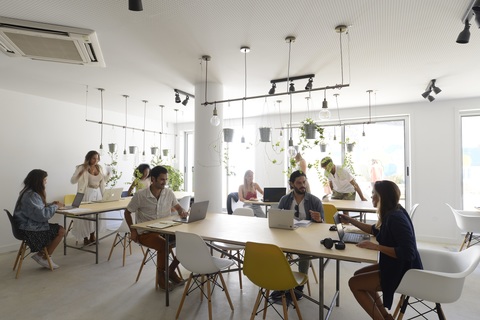 a group of people sitting at a table