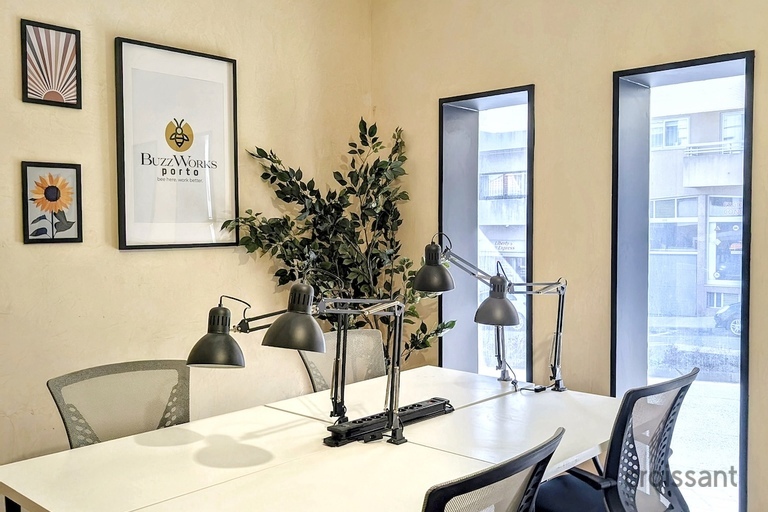 a living room filled with furniture and a large window