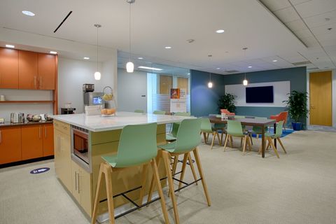 a room filled with furniture and a table