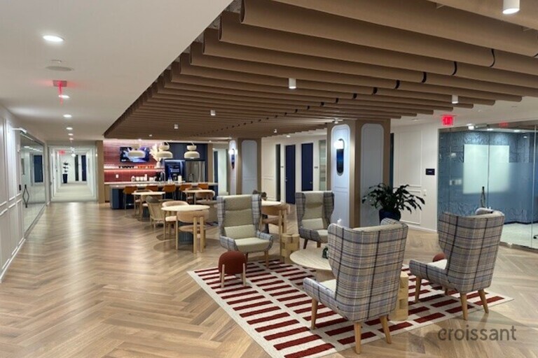 a room filled with furniture and a wood floor