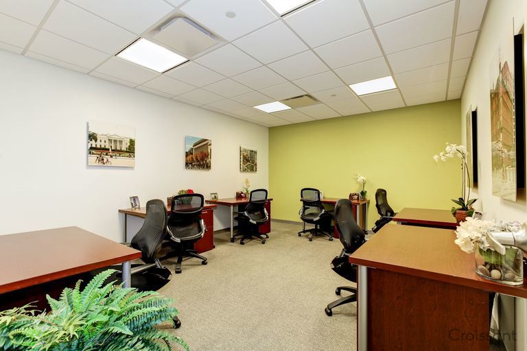 a kitchen with a table in a room