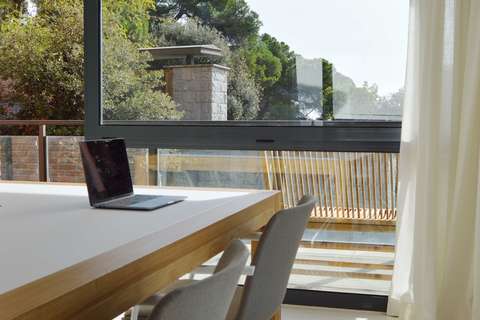a chair sitting in front of a window