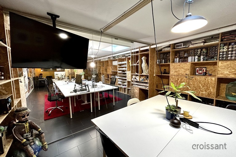 a kitchen with a table in a room