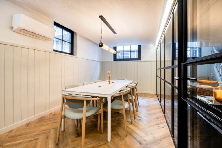 a kitchen with a table in a room