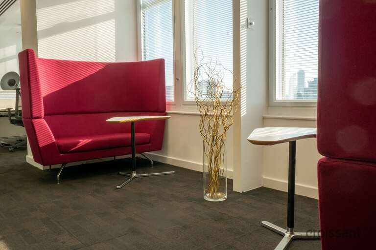 a chair sitting in front of a window