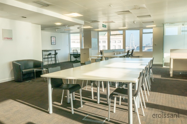 a room filled with furniture and a table