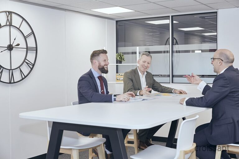 a group of people sitting at a table