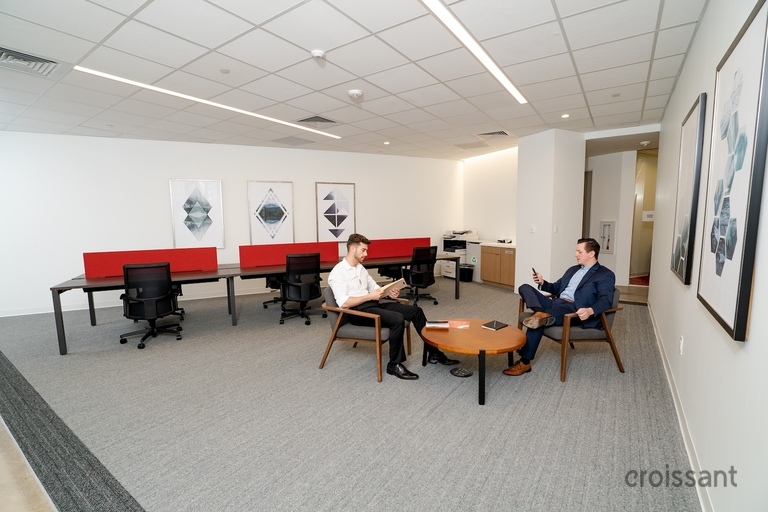 a room filled with furniture and a table