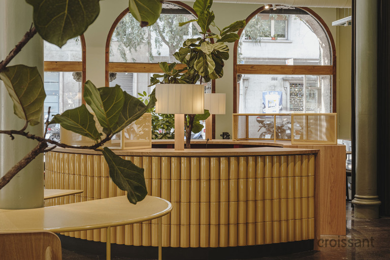 a table topped with a blue umbrella