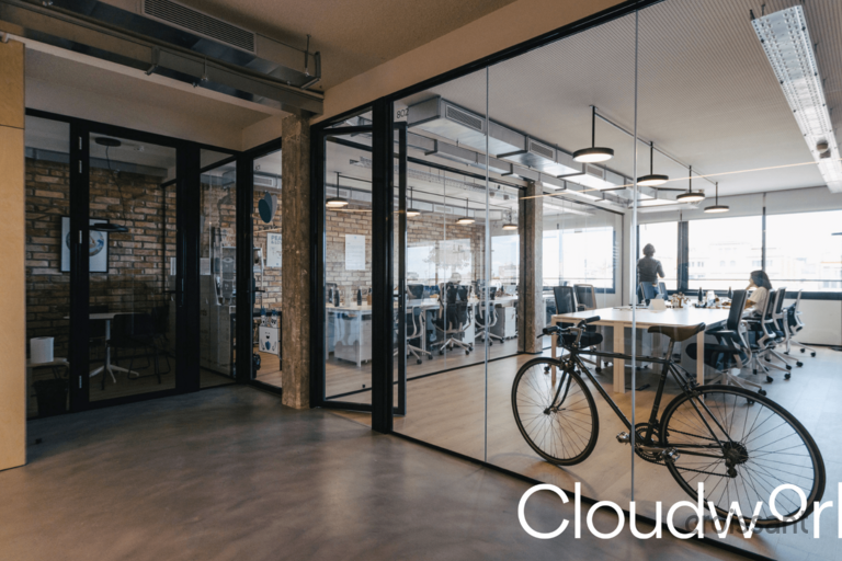 a bicycle parked on the side of a building