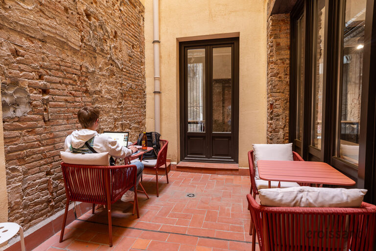 a room filled with furniture and a fire place