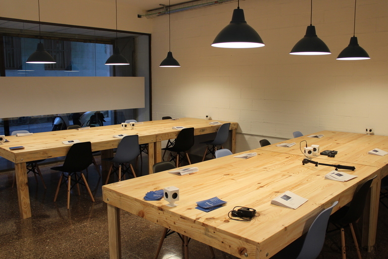 a desk with a chair and a table