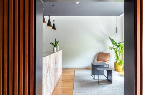 a chair sitting in front of a door