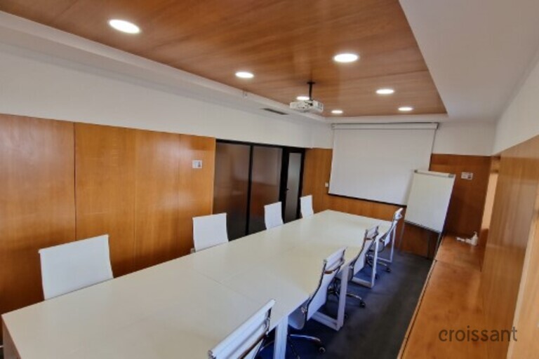 a kitchen with an island in the middle of a room