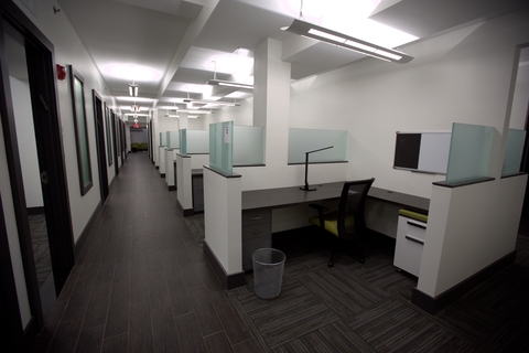 a subway travels down the tracks in a room