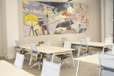 a room with a desk and chair