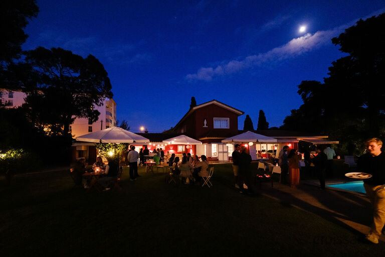 a group of people in a dark room