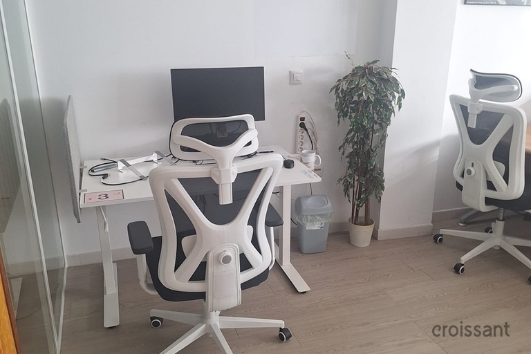 a desk and chair in a room