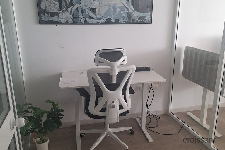 a desk and chair in a room