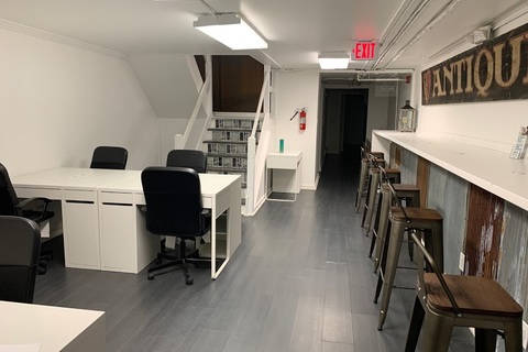 a room filled with furniture and a table