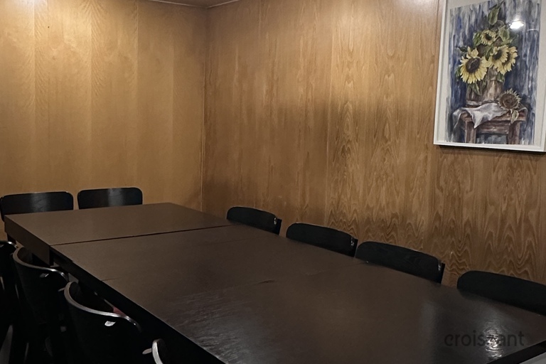 a kitchen with a light on a table