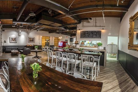 a kitchen with a dining room table