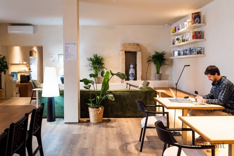 a person sitting on a chair in a room