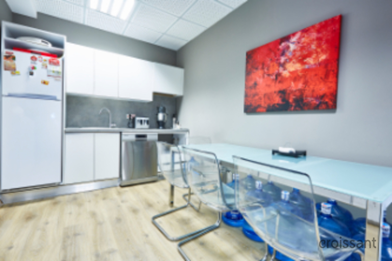 a stainless steel refrigerator in a kitchen