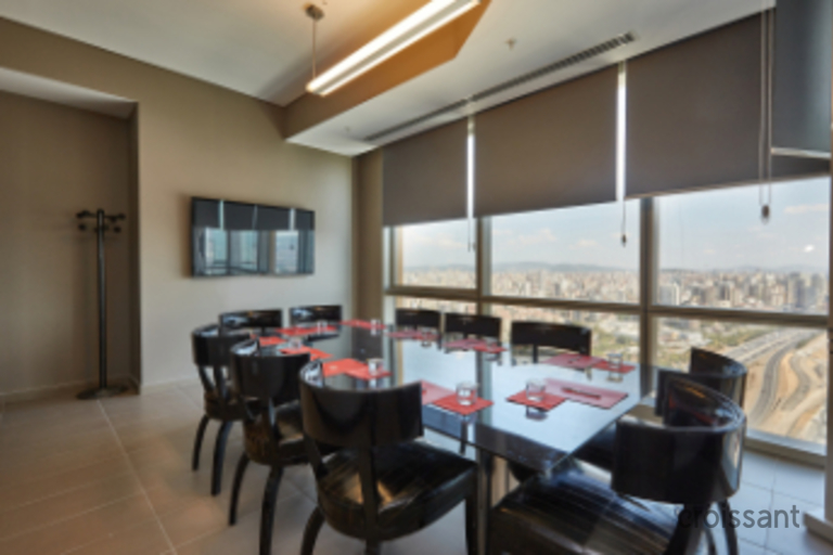 a kitchen with a table in a room