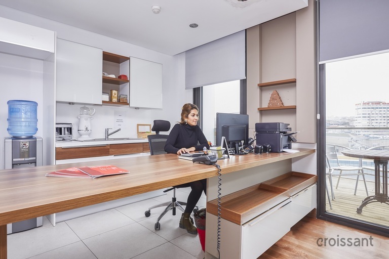 a kitchen with a table in a room