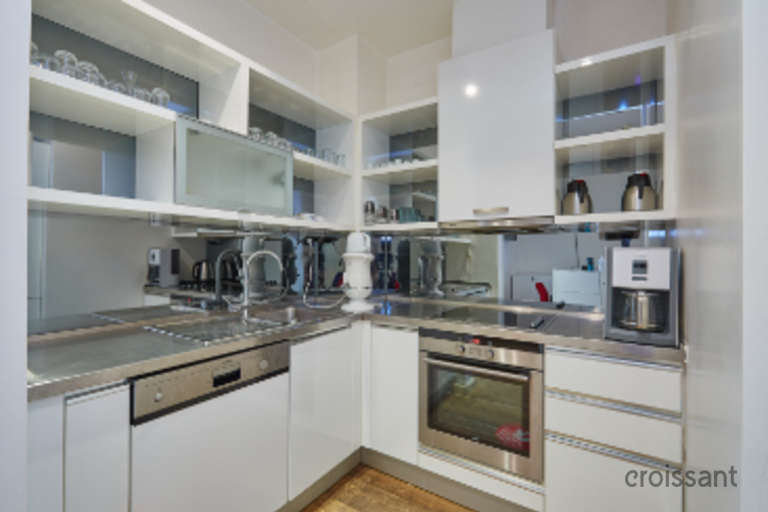 a kitchen with stainless steel appliances