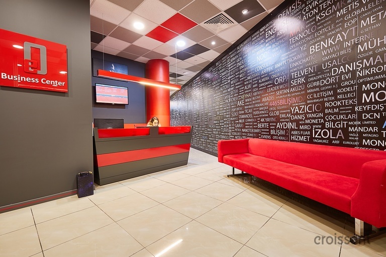 a stack of flyers on a table