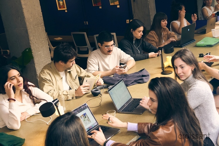 a group of people sitting at a table