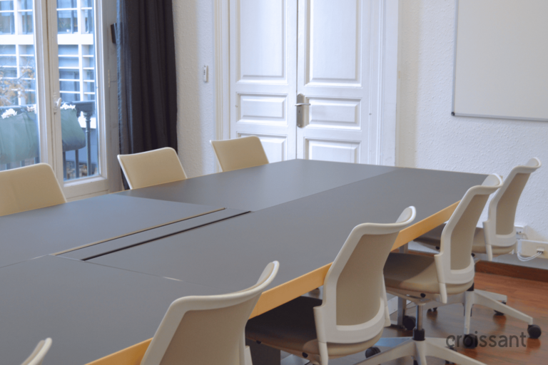 a chair sitting in front of a window