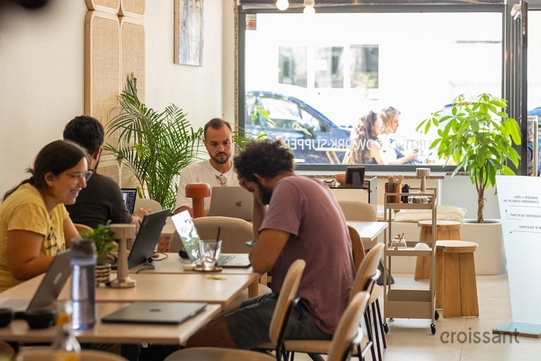 a group of people sitting at a table