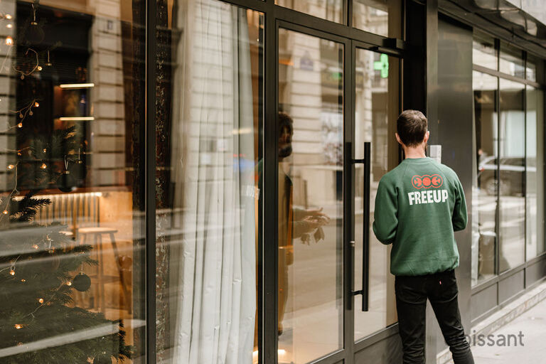 a person standing in front of a building