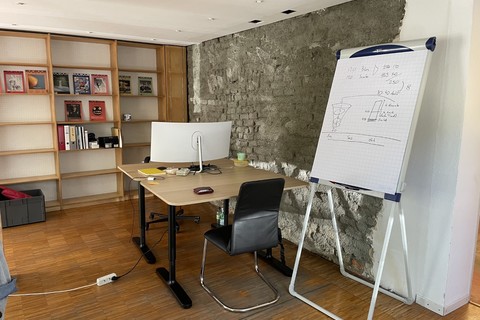 a room with a desk and chair