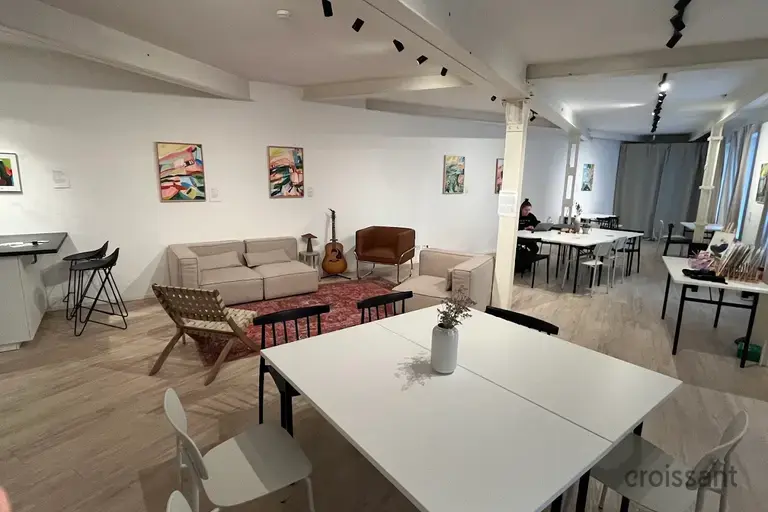 a room filled with furniture and a table