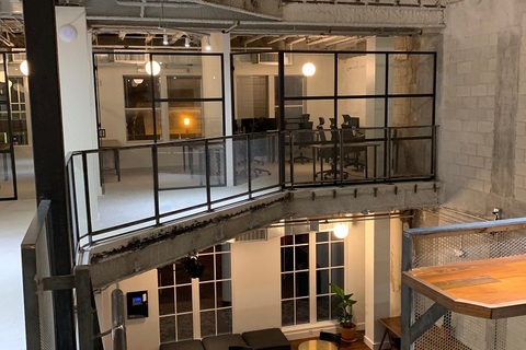 a room filled with furniture and a fireplace