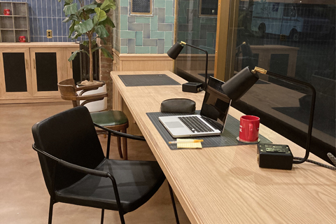 a dining room table in front of a window