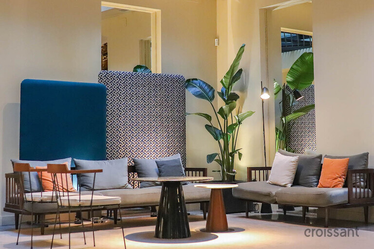 a living room with a leather chair