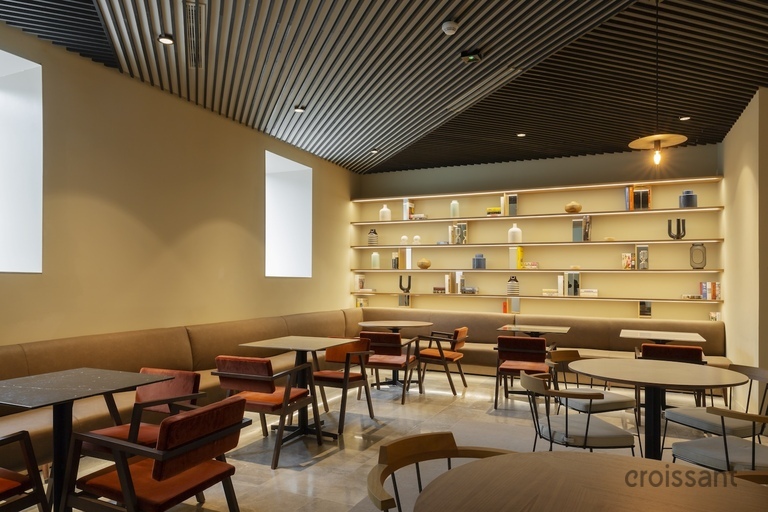 a room filled with furniture and a table